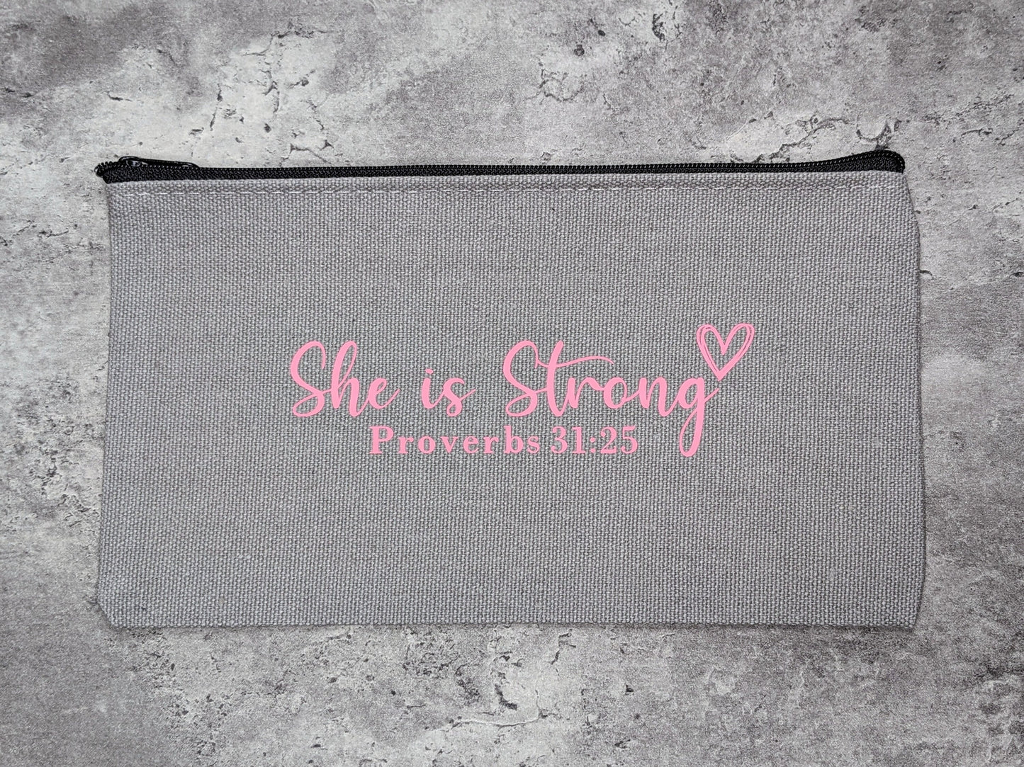 Necessär/Zipper bag - "She is Strong"
