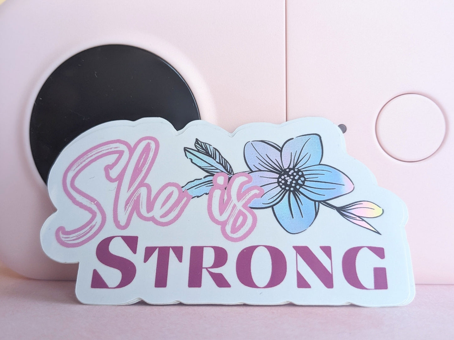 Sticker(holographic) - "She is Strong"