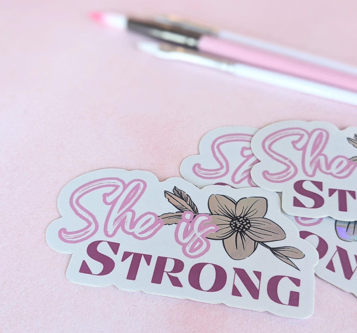 Sticker(holographic) - "She is Strong"